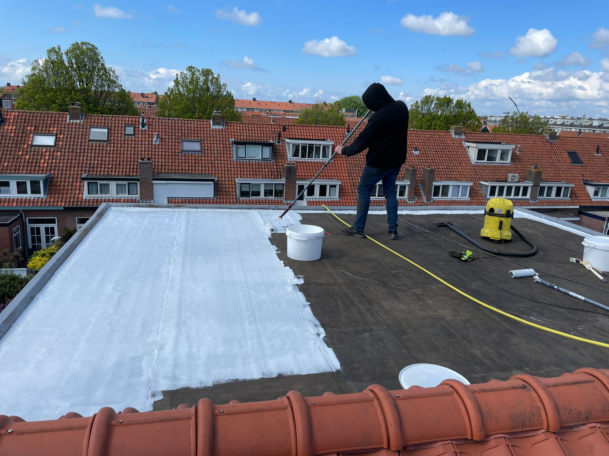 Roof Coating Working