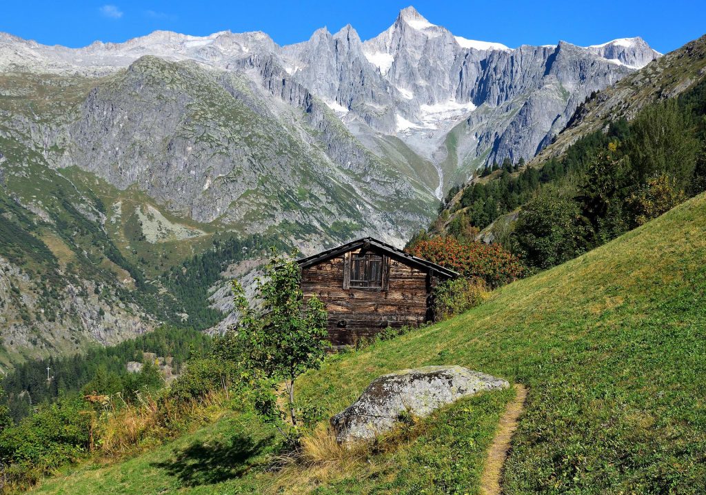 A beautiful example of a chalet in the imposing Swiss mountains.