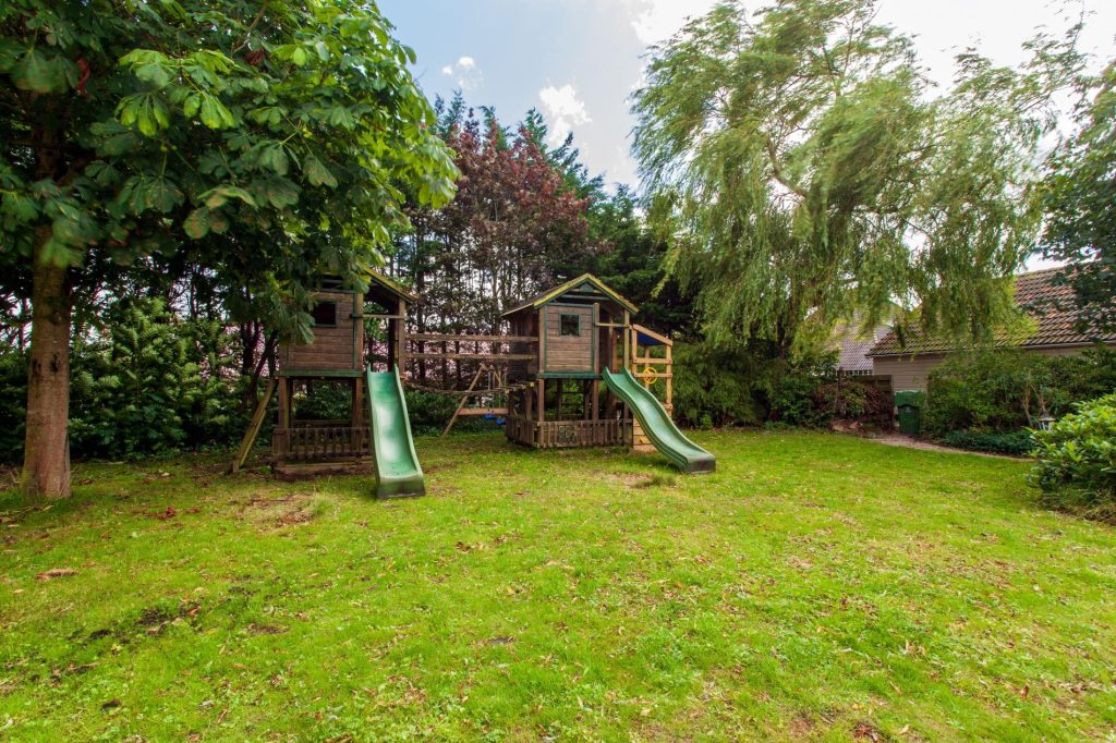 The villa has a beautiful wooden playground for the children!