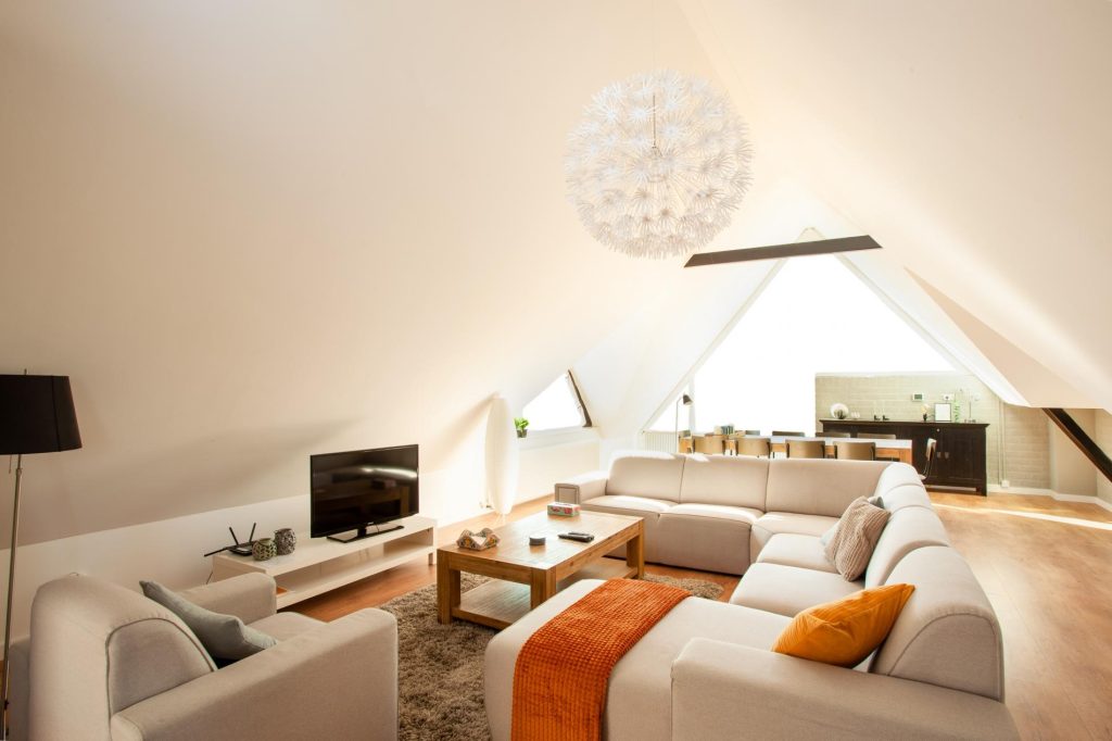 You can book this luxury vacation home right away! This is the lovely living room in Rijs